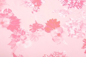 Detailed view of pink floral pattern on premium fabric for asymmetric summer dress