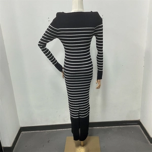 Detailed view of striped long-sleeve bodycon knit dress with round neck on mannequin