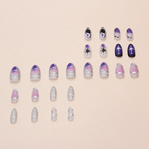 Purple galaxy press-on nails with starburst patterns and silver flowing line accents