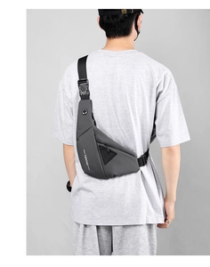 Detail of waterproof matte chest bag with adjustable strap and side branding logo