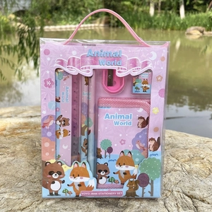 Detail view of pink Animal World stationery set including pencils and ruler in a clear case