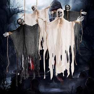 Hanging Halloween ghost decorations with skulls and tattered cloth for spooky outdoor party