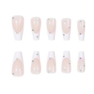 White French tip coffin press-on nails with iridescent rhinestones and nude base