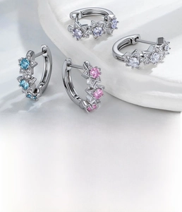 Detailed view of silver star hoop earrings featuring colorful zircon stones in 10mm size
