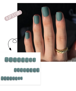 Detailed view showing matte dark green short press-on nails on hand and full set