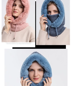 Detail of knitted winter balaclava with thick faux fur trim and adjustable drawstring