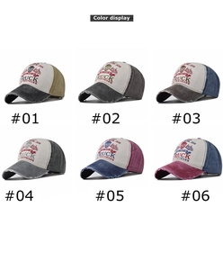 Color display of vintage washed cotton baseball caps with Ghost Rider skull printing