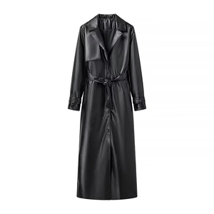 Chic black long faux leather trench coat with waist belt and classic lapels for women