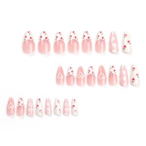 Pink heart and strawberry press-on nails with long almond shape and pearl accents