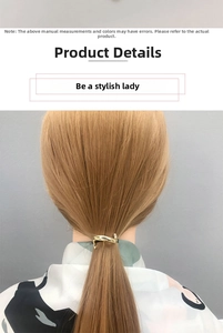 Golden irregular twist ponytail cuff showing modern minimalist alloy hair accessory detail