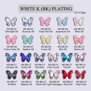 Vista macro de dijes de mariposa de cristal 3D en 22 colores para arte de uñas