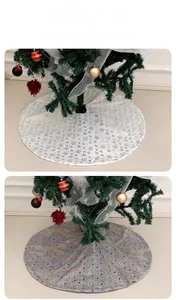 Detail of Christmas tree skirts featuring gold snowflakes and colored star patterns