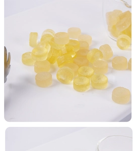 Macro view of miniature yellow radish slices on white marble with professional props