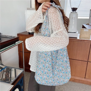 Light blue floral canvas tote bag for women, ideal for daily commute and casual use