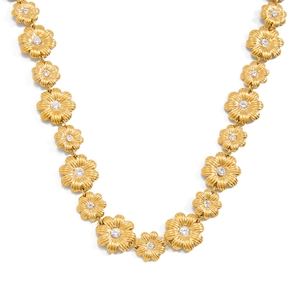 Detailansicht der 18K Gold-Gänseblümchenkette mit Zirkonia-Mitten und gebürsteter Textur