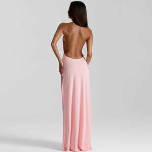 Detail view of pink backless halter maxi dress with elegant ruched draping and open back