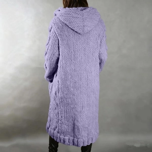 Macro detail of lavender chunky knit cardigan featuring cable stitch and vertical textures