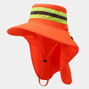 Detail of high-visibility orange safety hat with reflective stripes and sun neck protection