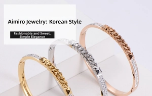Detailed view of woven chain texture and zircon inlay on titanium steel bangles