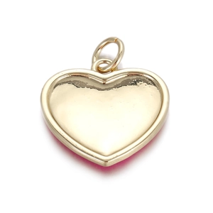 Macro shot of a golden heart pendant with a colorful oil painting flower design