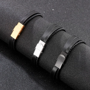 Detailed view of woven leather bracelets with gold, silver, and black magnetic clasps