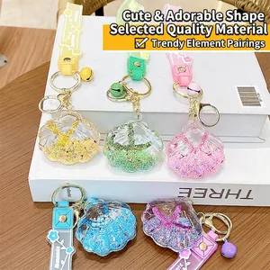 Set of five colorful starfish acrylic bottle keychains with sequins and silicone straps