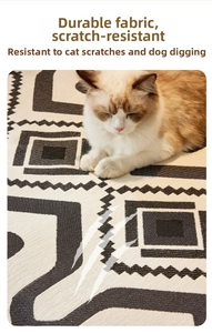 Close-up of thick chenille bohemian sofa cover showing scratch-resistant fabric with cat