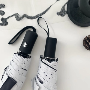 Automatic foldable UV sun and rain umbrella with artistic black and white ink dot pattern