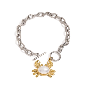 Silver thick chain bracelet with golden crab pendant and white pearl in ocean style