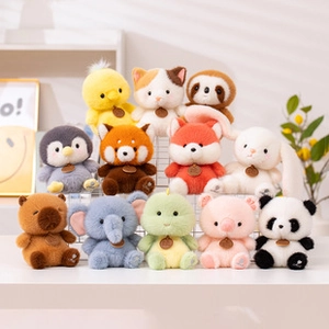 Group display of small plush animal pendants including panda fox and rabbit for bags