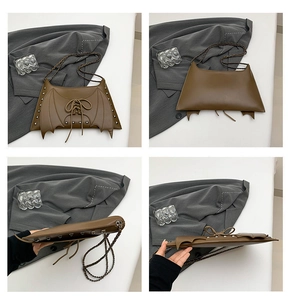 Sac à épaule élégant pour femme style chauve-souris avec rivets et chaîne tendance.