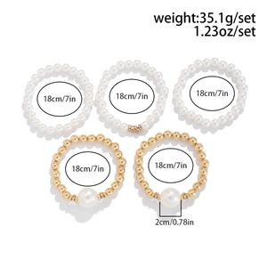 Detailed size chart for 5-piece multilayer pearl and gold bead bracelet set with bow charms