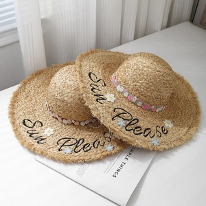 Handwoven raffia straw sun hat with Sun Please embroidery and floral appliques