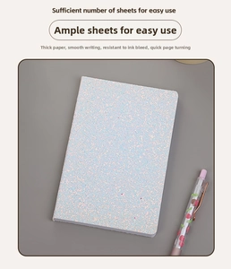 Detail of white sequin notebook with thick paper for smooth writing and no ink bleeding