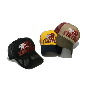 Retro mesh trucker hats with bull embroidery and curved brim in multiple colors