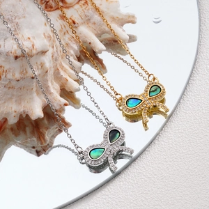 Elegant shell butterfly pendant necklace in gold and silver finish with zircon inlay