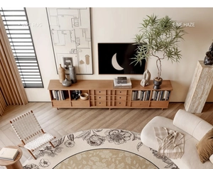 Detailed top view of a vintage round floral rug with waterproof beige and brown textures