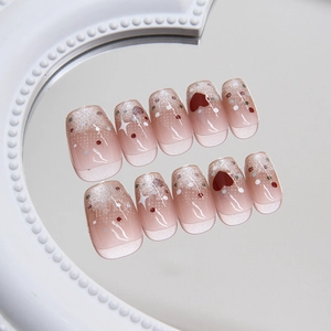 Cat eye press-on nails with red heart patterns and silver glitter in short round shape