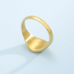 Minimalist geometric golden stainless steel ring with a smooth finish and brushed inner band