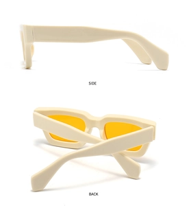 Detail view of cream oversized frames with orange lenses showing side and back profiles