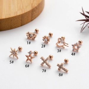 Eight rose gold stainless steel cartilage studs with white cubic zirconia in varied shapes