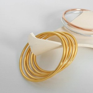 Minimalist titanium steel gold plated bangle bracelets in three metallic colors