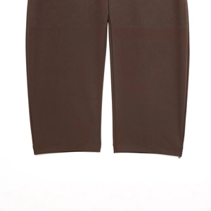 Deep brown houndstooth trousers showing high-quality hem stitching detail on a white background