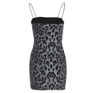 Detailed view of silver leopard print sequins and sleek slim fit design on a mini dress