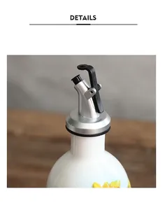Detail of sunflower ceramic oil bottle with a silver pressure-type metal pouring spout