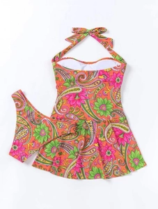 Two-piece floral halter tankini set with vibrant orange paisley print and A-line swim skirt