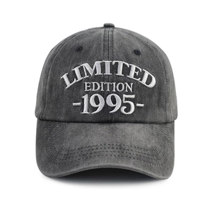 Detail of white 3D embroidery on washed charcoal cotton baseball cap with 1995 text