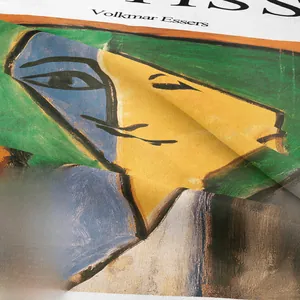 Close-up of Cubist art print on fabric with vibrant colors and twill texture details