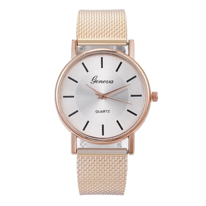 Detailed macro view of the Geneva quartz watch rose gold mesh strap and white dial
