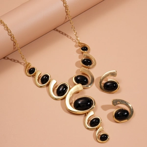 Parure collier et boucles d'oreilles vintage avec pierres noires ovales style sombre